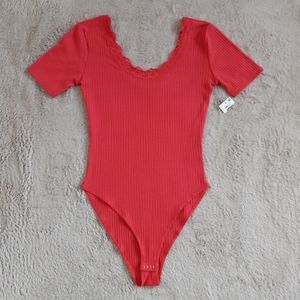 Bodysuit size S new never used